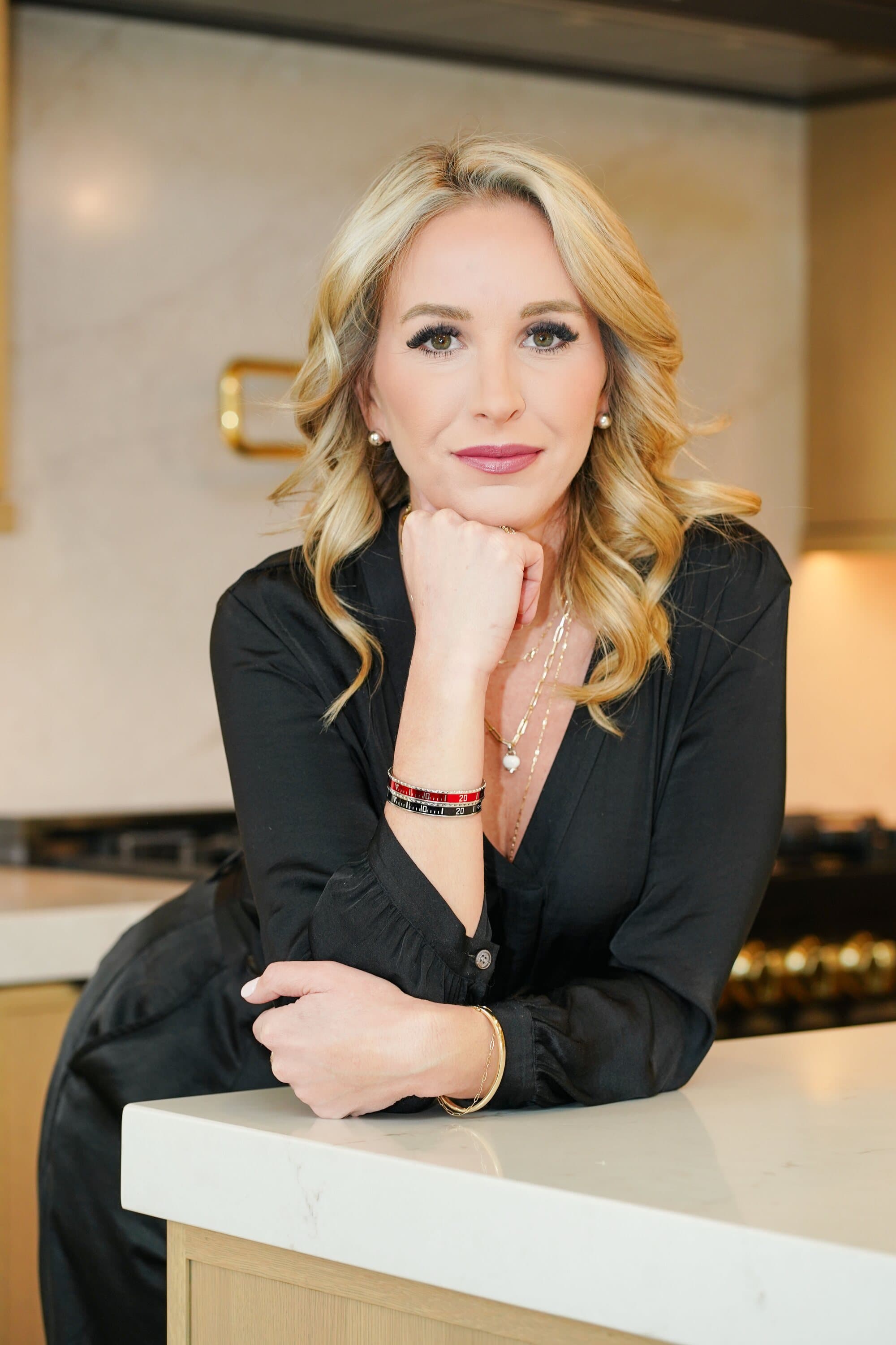 Portrait of Shelby Crisman in black at a counter